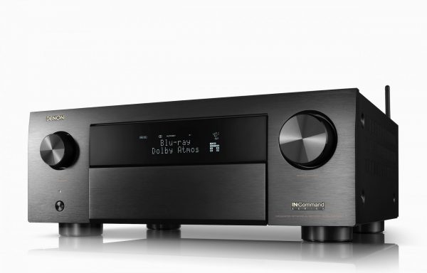 Front of Denon AVC-X4700H AV Receiver angling away to the left on white background