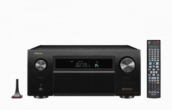 Front view of Denon AVC-X8500H AV Receiver with remote control and setup microphone