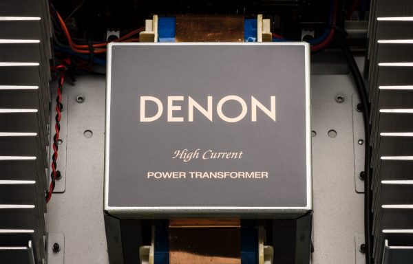 Internal view of Denon AVC-X8500H AV showing high current power transformer that is part of the internal components.