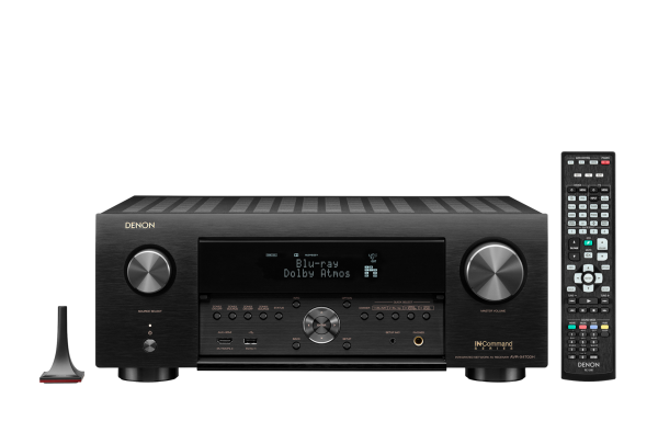 Front view of Denon AVC-X4700H AV Receiver with remote control, Audssesy microphone and front panel open.