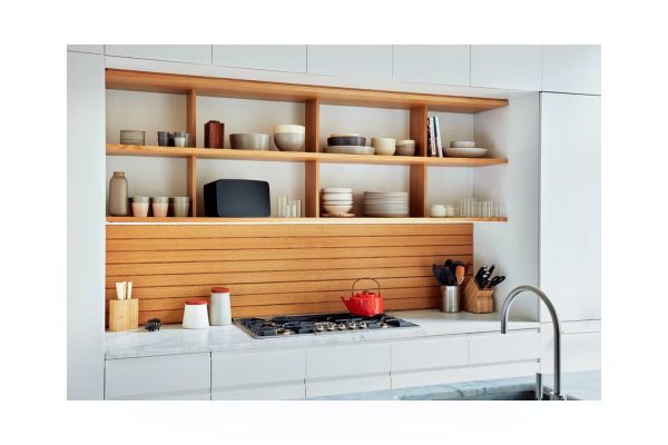 Lifestyle image of Black Sonos Five Premium Speaker on kitchen shelf