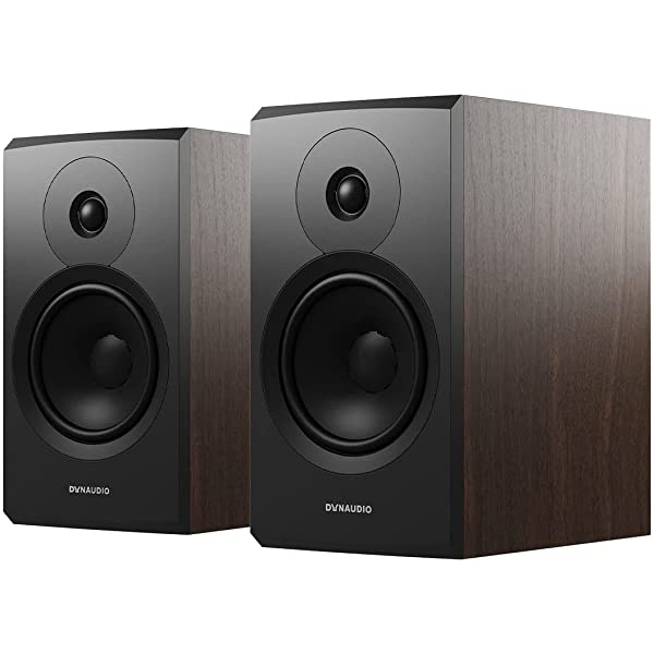Pair of Walnut Dynaudio Emit 10 on white background angled away to the left without speaker grills.